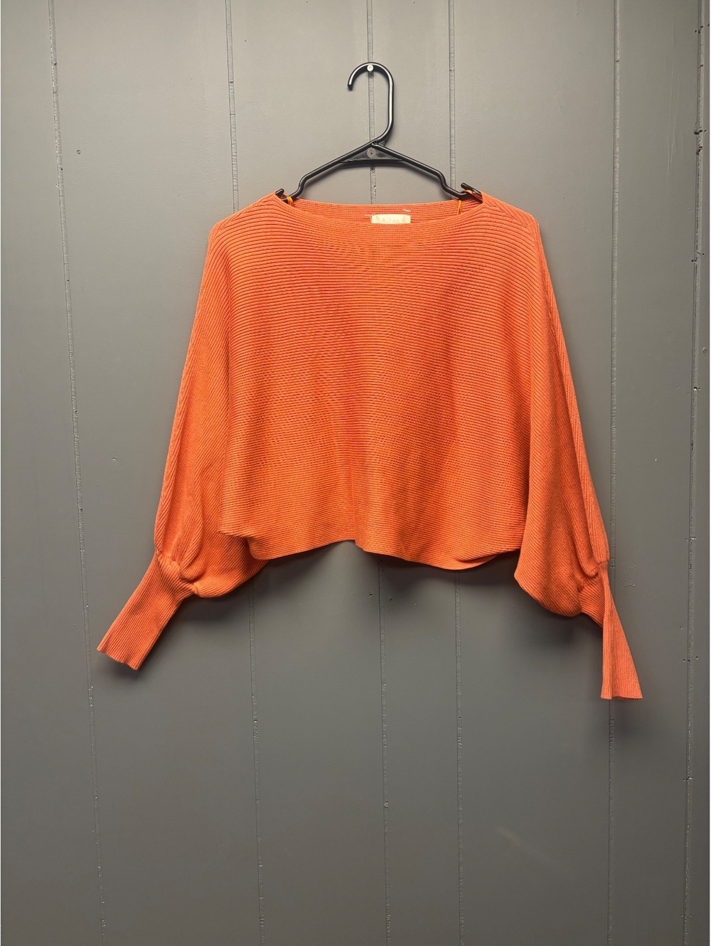orange ribbed long sleeve cropped top